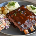 Beef back ribs grilled to perfection on a BBQ.