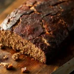 What not to put in meatloaf – a dry, cracked, and overcooked meatloaf with poor texture.